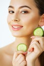 Skin Care. Portrait Beautiful Happy Woman With Cucumbers to Eyes Royalty Free Stock Photo