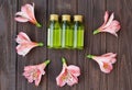 Skin care products and pink flowers Royalty Free Stock Photo