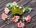 Skin care products and pink flowers Royalty Free Stock Photo