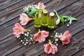 Skin care products and pink flowers Royalty Free Stock Photo