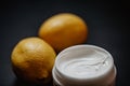 Skin care products with two lemons on the side