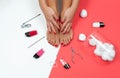 Beautiful female feet and hands at spa salon on pedicure and manicure procedure Royalty Free Stock Photo