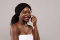 Skin Care Treatments. Portraif Of Beautiful African American Female Wrapped In Towel