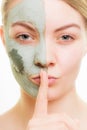 Skin care. Woman in clay mud mask on face. Beauty. Royalty Free Stock Photo