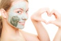 Skin care. Woman in clay mud mask on face. Beauty. Royalty Free Stock Photo