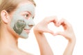 Skin care. Woman in clay mud mask on face. Beauty. Royalty Free Stock Photo