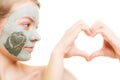 Skin care. Woman in clay mud mask on face. Beauty. Royalty Free Stock Photo
