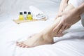 Skin care women legs with skin care products. Royalty Free Stock Photo