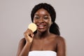 Skin Cleansing Concept. Portraif Of Beautiful African American Female Holding Cosmetic Sponge