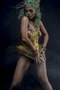 Skin, Latin woman with green hair and gold costume with handmade Royalty Free Stock Photo