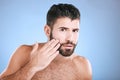 Skincare, beard grooming and portrait of man on blue background for beauty, wellness and salon. Luxury spa, dermatology