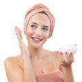 Skincare, cheerful young woman smiling, applying moisturizing cream on face, lotion or mask for skin lifting and anti-aging, wears Royalty Free Stock Photo