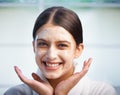 Skincare, clay and portrait of happy woman in face mask in bathroom for hydration at home. Smile, facial treatment and