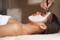 Skincare, clay and woman with face mask at spa for glow, wellness and beauty routine with self care. Cosmetic, pamper