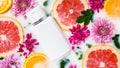 Skincare cosmetic product in milk water with flowers, grapefruit and orange slices. Organic floral or citrus cosmetics. Lotion,