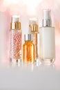 Skincare cosmetics products on glamour background, glass bottles with serum, oil, face cream moisturiser, facial lotion