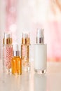 Skincare cosmetics products on glamour background, glass bottles with serum, oil, face cream moisturiser, facial lotion