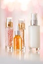 Skincare cosmetics products on glamour background, glass bottles with serum, oil, face cream moisturiser, facial lotion