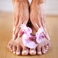 Skincare girl and hands with flowers on feet for luxury cosmetic treatment with manicure and pedicure nails. Healthy Royalty Free Stock Photo