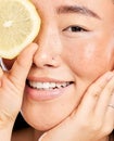 Skincare, glow and portrait of a healthy woman with a lemon for body detox, health and wellness. Vitamin c, food and