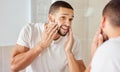 Skincare, mirror and man in house with hands on face for beard, inspection or facial hair growth. Beauty, reflection and Royalty Free Stock Photo