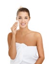 Skincare, portrait or woman with cotton pad in studio for wellness, shine or glow on white background. Cleaning, face or