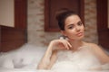 Skincare. Wellness. Young woman relaxing in jacuzzi bath spa, br