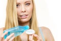 Woman cleaning her face skin with cotton pad Royalty Free Stock Photo