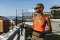 Skinhead girl at a LA rooftop