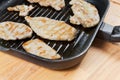 Skinless chicken breast in a pan Royalty Free Stock Photo