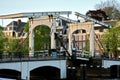 Skinny bridge or magere brug in Amsterdam crossing the amstel river Royalty Free Stock Photo