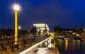 The Skinny Bridge Magere Brug at night, Amsterdam, Holland, Europe. Royalty Free Stock Photo