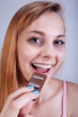 Skinny girl eats sweets Royalty Free Stock Photo