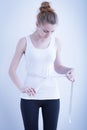 Skinny girl measuring waist Royalty Free Stock Photo