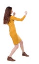 Skinny woman funny fights waving his arms and legs. Royalty Free Stock Photo