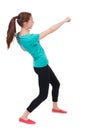 Skinny woman funny fights waving his arms and legs. Royalty Free Stock Photo