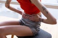 Skinny woman touching her stomach while having pain Royalty Free Stock Photo