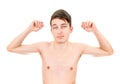 Skinny Young Man Muscle Flexing Royalty Free Stock Photo