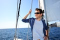 Skipper standing on sailing boat Royalty Free Stock Photo