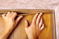 Skirting installation,master produces mounting  baseboard in the house Royalty Free Stock Photo