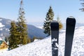 skis on snow hill mountain,winter alpine ski resort,extreme sport holiday winter Carpathian mountain panoramic scenic Royalty Free Stock Photo