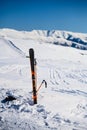 Skis in snow at mountain top