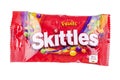 Skittles fruit-flavoured candies isolated on white background.