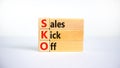SKO sails kick off symbol. Concept words SKO sails kick off on wooden blocks. Beautiful white background, copy space. Business and