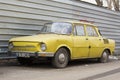 Vintage Skoda car abandoned on the street