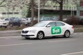 Skoda Superb of Bolt delivery company with motion blur effect