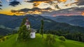 Skofja Loka, Slovenia - Amazing colorful sunset at the beautiful Sveti Tomaz Saint Thomas hilltop church Royalty Free Stock Photo