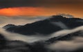 Skofja Loka, Slovenia - Long exposure panoramic shot of the mountains of Kranj region taken from Jamnik with summer morning fog