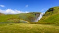 Skogafoss waterfall with rainbow, Iceland Royalty Free Stock Photo