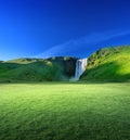 Skogarfoss waterfall and summer sunny day Royalty Free Stock Photo